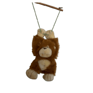 Aap hangend aan stok