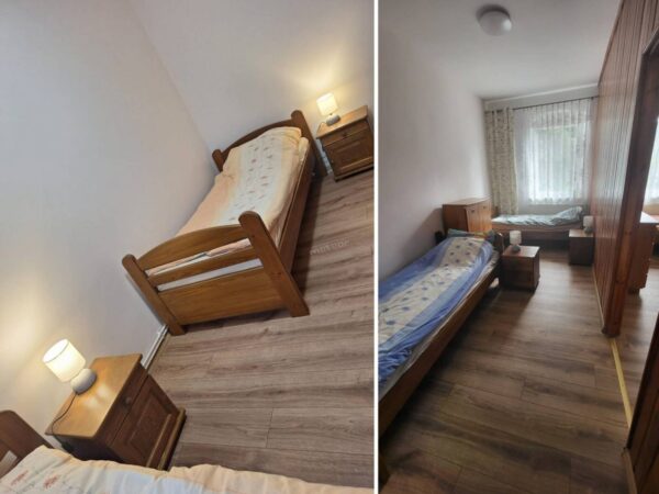 Twin bedroom with wooden beds, two single mattresses, and matching nightstands in a small, tidy room with lamps.